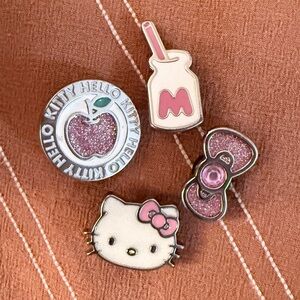 4 hello kitty metal croc charms